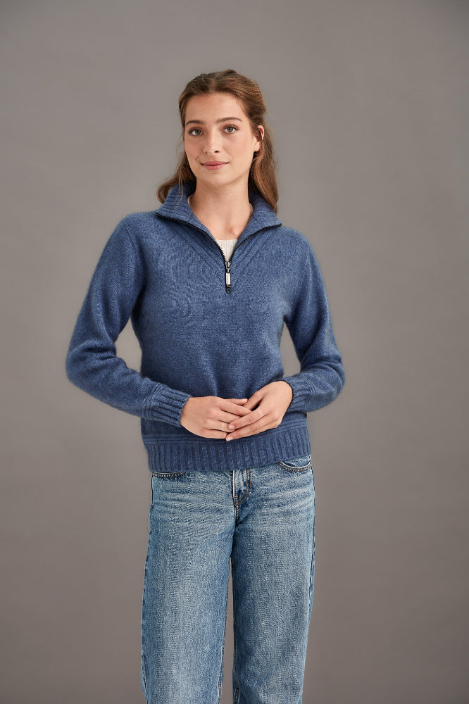 Possum and Merino 5040 Ridge Funnel Neck – A beautiful sweater made from the ultimate combination of natural fibres for warmth without weight. Featuring ridge patter neck detailing and ¼ zip for ease of wear. ¼ zip and high collar Feature rib knit on neck Mid-weight warmth 35% Possum Fur, 55% Merino Wool, 10% Pure Mulberry Silk New Zealand designed and manufactured