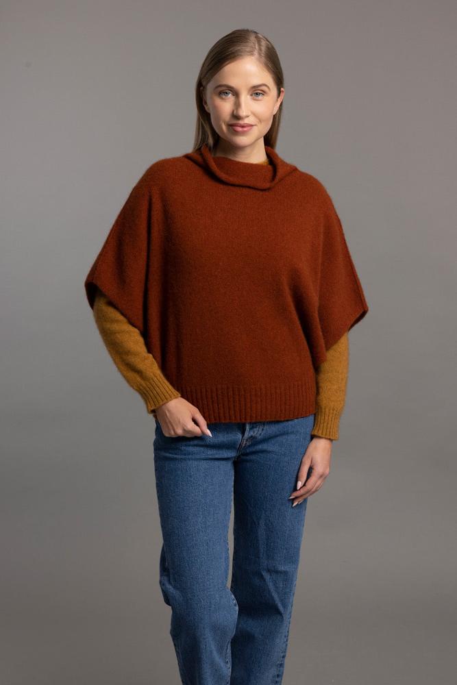 Possum and Merino 5043 Shrug Sweater – This Shrug Sweater impresses with its form and function, artfully draping on the body while keeping you exceptionally warm. Natural wool and possum fibres combine with delicate mulberry silk to create a forever knit you will cherish for years to come. Shrug style short sleeve sweater Lightweight warmth 35% Possum Fur, 55% Merino Wool, 10% Pure Mulberry Silk New Zealand designed and manufactured