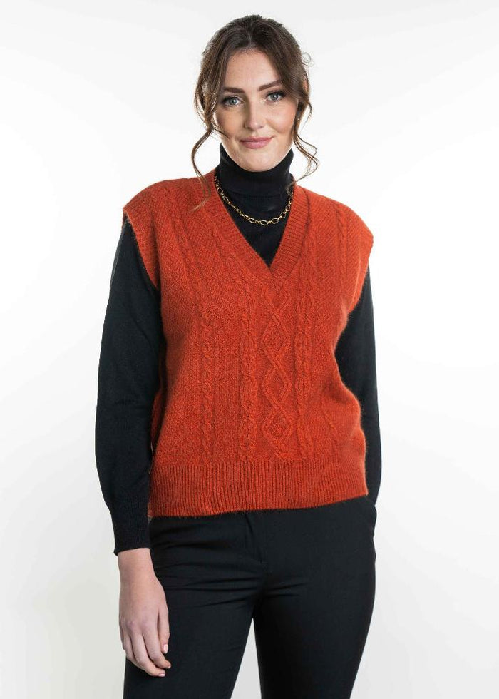 Possum and Merino
KO563 Cable Vest - A classic V Neck vest. A versatile piece for layering in every season. Crafted with vertical patterns, this vest combines a timeless design with a modern twist. Dress it up for a corporate or chic look or dress it down for an everyday casual look. An absolute wardrobe staple.
Made proudly in New Zealand from a premium blend of 40% possum fur, 50% merino lambswool and 10% mulberry silk.
