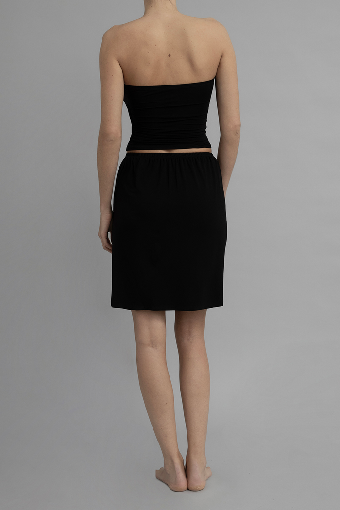 Front View of Recline Skirt in Black from KYE Intimates in Los Angeles.