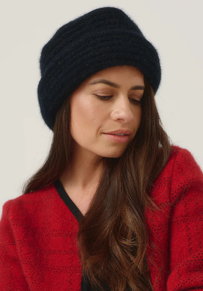 Possum and Merino

008009 Merinomink Felted Hat - A signature piece in the Merinomink collection, the Felted Hat fits perfectly. Offering a more dressed up look, it is an excellent choice for your winter escapes. A classic fit.

Made in New Zealand from an exclusive Merinomink blend of 50% ZQ Merino, 40% Brushtail possum and 10% Mulberry silk.