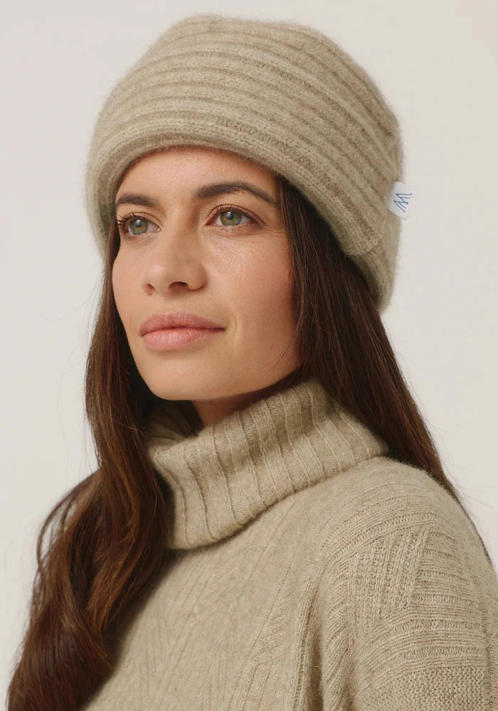 Possum and Merino

008009 Merinomink Felted Hat - A signature piece in the Merinomink collection, the Felted Hat fits perfectly. Offering a more dressed up look, it is an excellent choice for your winter escapes. A classic fit.

Made in New Zealand from an exclusive Merinomink blend of 50% ZQ Merino, 40% Brushtail possum and 10% Mulberry silk.