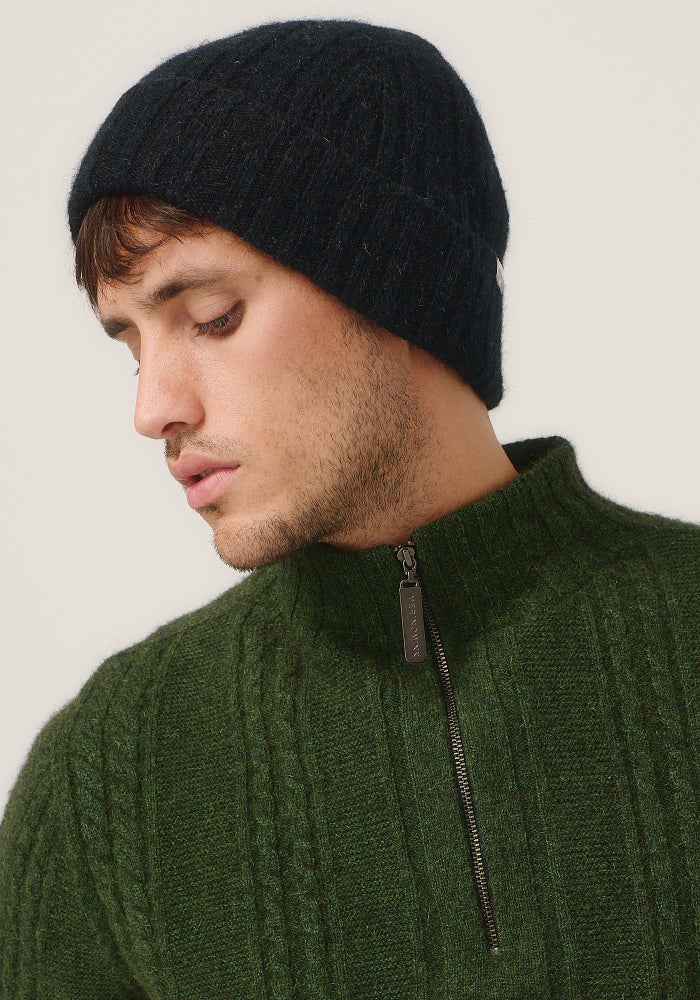 Possum and Merino

0527 Rib Beanie - A heater for your head, this fitted Merinomink beanie is big on cosiness, but light to wear. Rib detail and Merinomink branding add a touch of designer detail. A slim fit.

Made in New Zealand from an exclusive Merinomink blend of 50% ZQ Merino, 40% Brushtail possum and 10% Mulberry silk.
