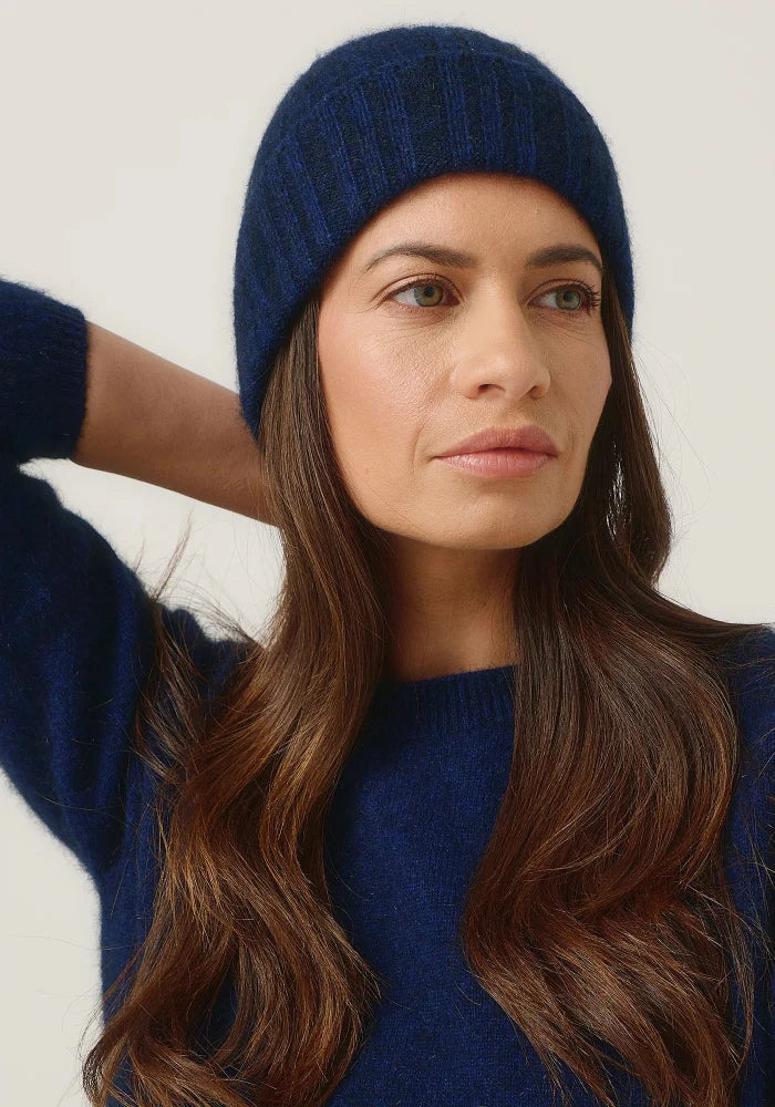 Possum and Merino

0527 Rib Beanie - A heater for your head, this fitted Merinomink beanie is big on cosiness, but light to wear. Rib detail and Merinomink branding add a touch of designer detail. A slim fit.

Made in New Zealand from an exclusive Merinomink blend of 50% ZQ Merino, 40% Brushtail possum and 10% Mulberry silk.