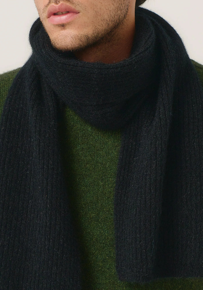 Possum and Merino

0578 Ribbed Scarf - The classic rib scarf never goes out of style. Styled with coats and jackets it will elevate your outfit and keep you cosy.

Made in New Zealand from an exclusive Merinomink blend of 50% ZQ Merino, 40% Brushtail possum and 10% Mulberry silk.