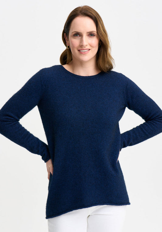 Possum and Merino

100290 Essential Sweater - As its name suggests every wardrobe needs one of these. The ultimate in cosy comfort, the Essential will take you wherever you want to go. With a dipped back hem and crew neckline, it's a timeless silhouette you'll love. Pair it with the essential snood and - voila! You have a rollneck. Classic fit.&nbsp;

Made in New Zealand from an exclusive Merinomink blend of 50% ZQ Merino, 40% Brushtail possum and 10% Mulberry silk.