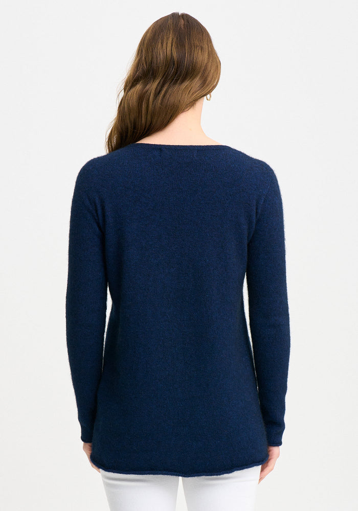 Possum and Merino

100290 Essential Sweater - As its name suggests every wardrobe needs one of these. The ultimate in cosy comfort, the Essential will take you wherever you want to go. With a dipped back hem and crew neckline, it's a timeless silhouette you'll love. Pair it with the essential snood and - voila! You have a rollneck. Classic fit.&nbsp;

Made in New Zealand from an exclusive Merinomink blend of 50% ZQ Merino, 40% Brushtail possum and 10% Mulberry silk.