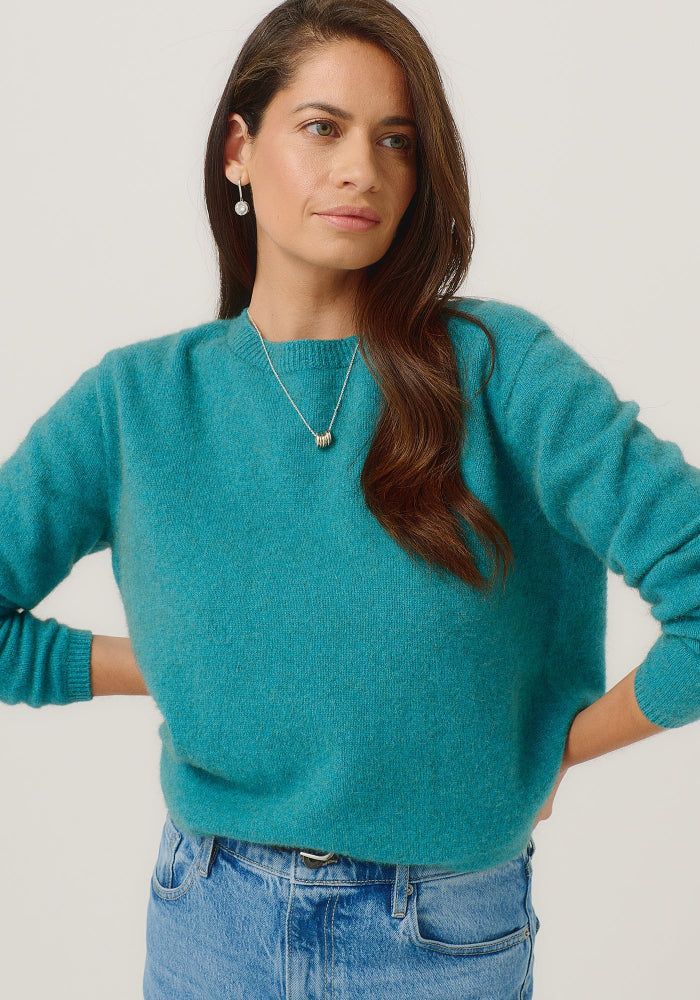Possum and Merino

100296 Mia Crew - The go-to crew that you'll wear on repeat. This ageless style has a slim, classic fit and is short but not cropped in length. It features new Merinomink branding. Team it with the Essential Snood to effortlessly transform it into a rollneck.&nbsp;

Made in New Zealand from an exclusive Merinomink blend of 50% ZQ Merino, 40% Brushtail possum and 10% Mulberry silk.