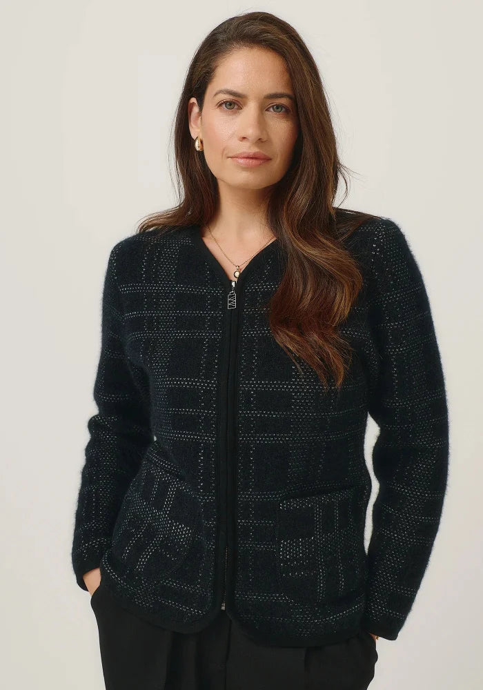 Possum and Merino

100298 Eloise Jacket - Eloise is all about style and grace. A refined silhouette and soft v neckline is met with a zipper that comes down to a curved front hem. A Merinomink zip pull and pockets add to the thoughtful design of this jacket. With a felted finish and subtle check detail, this new jacket is poised to become a highly coveted piece. Slim fit.&nbsp;

Made in New Zealand from an exclusive Merinomink blend of 50% ZQ Merino, 40% Brushtail possum and 10% Mulberry silk.