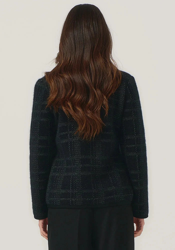Possum and Merino

100298 Eloise Jacket - Eloise is all about style and grace. A refined silhouette and soft v neckline is met with a zipper that comes down to a curved front hem. A Merinomink zip pull and pockets add to the thoughtful design of this jacket. With a felted finish and subtle check detail, this new jacket is poised to become a highly coveted piece. Slim fit.&nbsp;

Made in New Zealand from an exclusive Merinomink blend of 50% ZQ Merino, 40% Brushtail possum and 10% Mulberry silk.