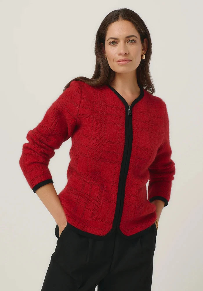 Possum and Merino

100298 Eloise Jacket - Eloise is all about style and grace. A refined silhouette and soft v neckline is met with a zipper that comes down to a curved front hem. A Merinomink zip pull and pockets add to the thoughtful design of this jacket. With a felted finish and subtle check detail, this new jacket is poised to become a highly coveted piece. Slim fit.&nbsp;

Made in New Zealand from an exclusive Merinomink blend of 50% ZQ Merino, 40% Brushtail possum and 10% Mulberry silk.