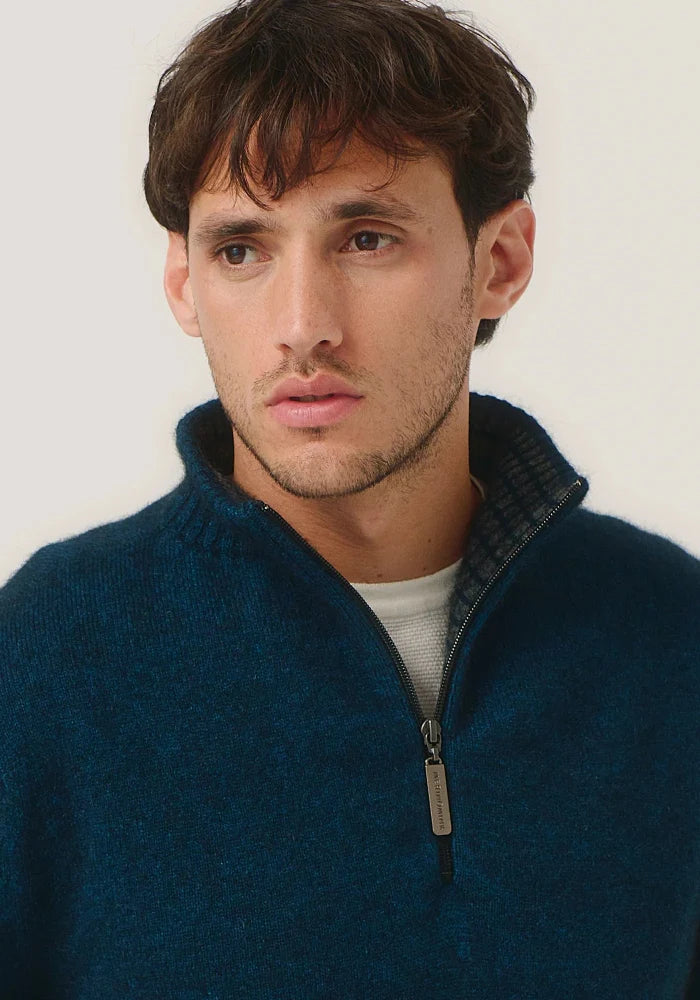 Possum and Merino

100309 Whittaker Half Zip – A Merinomink signature zip sweater with striped contrast collar features a Merinomink zip pull. This timeless piece can be dressed up or down to suit almost any occasion. A classic fit.

Made in New Zealand from an exclusive Merinomink blend of 50% ZQ Merino, 40% Brushtail possum and 10% Mulberry silk.