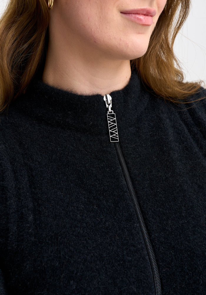 Possum and Merino

100351 Mattison Vest - For golf days, gardening, or a girls day out, the Mattison is a must-have. This slim-fitting zip up vest is your recipe for a warm core through the cooler months.&nbsp;

Made in New Zealand from our exclusive Merinomink blend of 50% ZQ Merino, 40% Brushtail possum and 10% Mulberry silk.