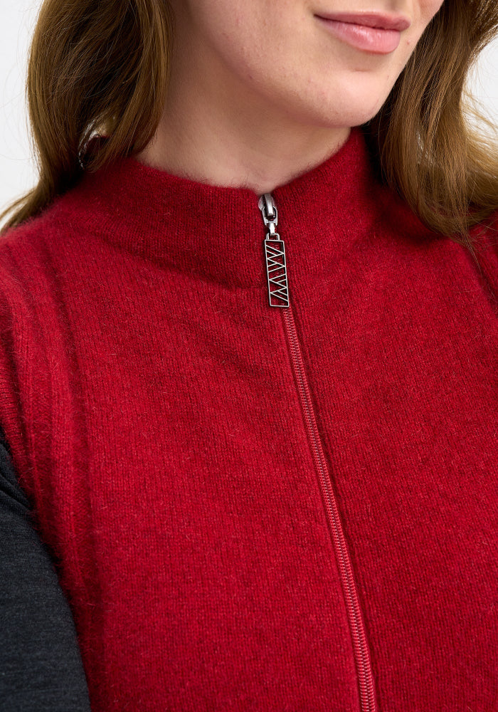 Possum and Merino

100351 Mattison Vest - For golf days, gardening, or a girls day out, the Mattison is a must-have. This slim-fitting zip up vest is your recipe for a warm core through the cooler months.&nbsp;

Made in New Zealand from our exclusive Merinomink blend of 50% ZQ Merino, 40% Brushtail possum and 10% Mulberry silk.