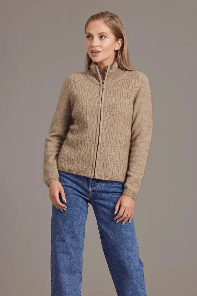 Possum and Merino  5039 Cable Zip Jacket - So versatile and easy to wear you will love this new zip-up Jacket with its delicate and feminine cable detailing.  Lace Cable Detail Mid Weight for warmth and comfort 35% Possum Fur, 55% Merino Wool, 10% Pure Mulberry Silk New Zealand Designed and Manufactured
