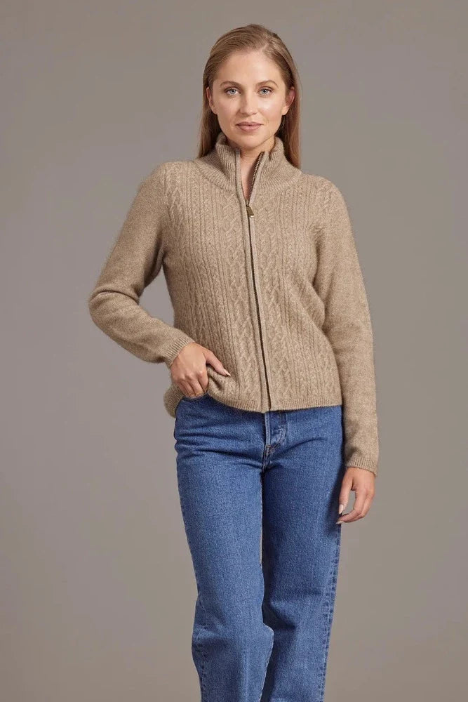 Possum and Merino  5039 Cable Zip Jacket - So versatile and easy to wear you will love this new zip-up Jacket with its delicate and feminine cable detailing.  Lace Cable Detail Mid Weight for warmth and comfort 35% Possum Fur, 55% Merino Wool, 10% Pure Mulberry Silk New Zealand Designed and Manufactured