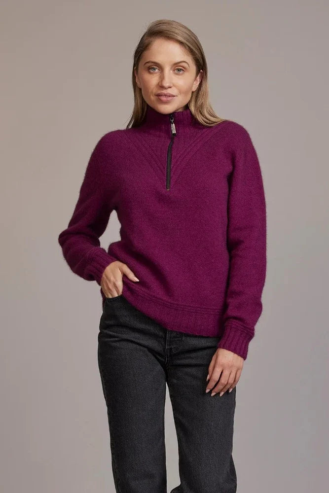 Possum and Merino  5040 Ridge Funnel Neck – A beautiful sweater made from the ultimate combination of natural fibres for warmth without weight.  Featuring ridge patter neck detailing and ¼ zip for ease of wear.  ¼ zip and high collar Feature rib knit on neck Mid-weight warmth 35% Possum Fur, 55% Merino Wool, 10% Pure Mulberry Silk New Zealand designed and manufactured