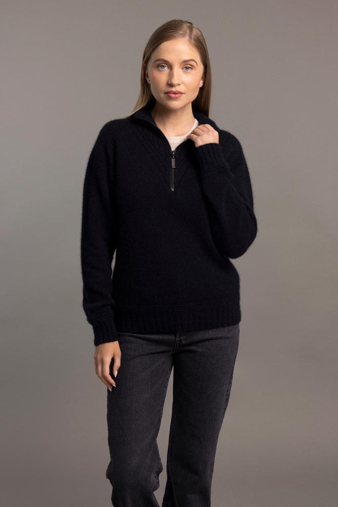Possum and Merino  5040 Ridge Funnel Neck – A beautiful sweater made from the ultimate combination of natural fibres for warmth without weight.  Featuring ridge patter neck detailing and ¼ zip for ease of wear.  ¼ zip and high collar Feature rib knit on neck Mid-weight warmth 35% Possum Fur, 55% Merino Wool, 10% Pure Mulberry Silk New Zealand designed and manufactured