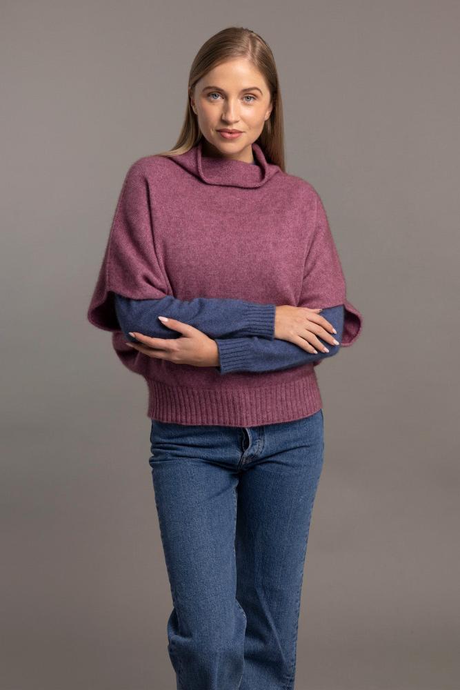 Possum and Merino  5043 Shrug Sweater – This Shrug Sweater impresses with its form and function, artfully draping on the body while keeping you exceptionally warm.  Natural wool and possum fibres combine with delicate mulberry silk to create a forever knit you will cherish for years to come.  Shrug style short sleeve sweater Lightweight warmth 35% Possum Fur, 55% Merino Wool, 10% Pure Mulberry Silk New Zealand designed and manufactured