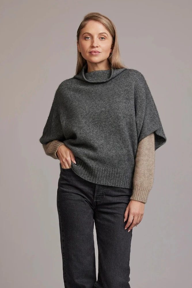 Possum and Merino  5043 Shrug Sweater – This Shrug Sweater impresses with its form and function, artfully draping on the body while keeping you exceptionally warm.  Natural wool and possum fibres combine with delicate mulberry silk to create a forever knit you will cherish for years to come.  Shrug style short sleeve sweater Lightweight warmth 35% Possum Fur, 55% Merino Wool, 10% Pure Mulberry Silk New Zealand designed and manufactured