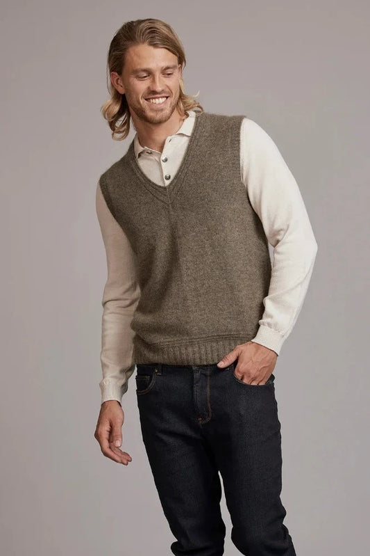 Possum and Merino  6636 Ridge Vest – A classic vest with feature ridge neck detailing, the blend of natural Merino, Possum fur and Silk fibres will ensure the cold never gets in.  Hold onto this sumptuous vest and don’t let go until the mercury rises.  Rib detailing on neck 35% Possum Fur, 55% Merino Wool, 10% Pure Mulberry Silk New Zealand designed and manufactured
