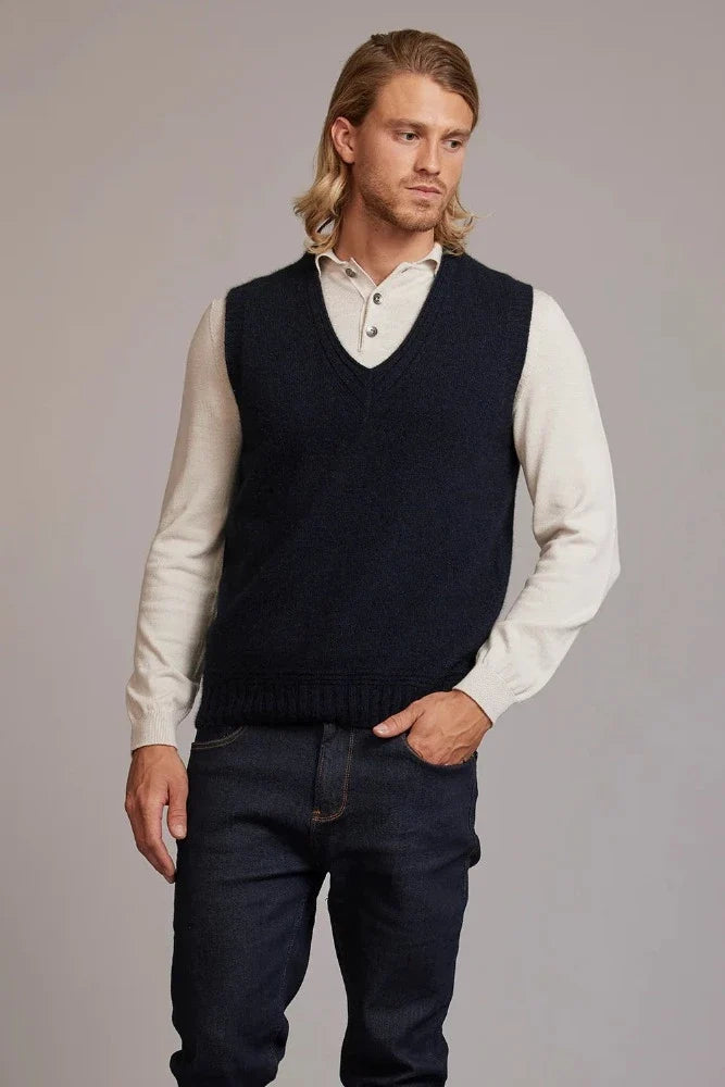Possum and Merino  6636 Ridge Vest – A classic vest with feature ridge neck detailing, the blend of natural Merino, Possum fur and Silk fibres will ensure the cold never gets in.  Hold onto this sumptuous vest and don’t let go until the mercury rises.  Rib detailing on neck 35% Possum Fur, 55% Merino Wool, 10% Pure Mulberry Silk New Zealand designed and manufactured