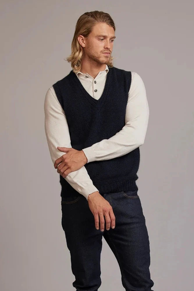 Possum and Merino  6636 Ridge Vest – A classic vest with feature ridge neck detailing, the blend of natural Merino, Possum fur and Silk fibres will ensure the cold never gets in.  Hold onto this sumptuous vest and don’t let go until the mercury rises.  Rib detailing on neck 35% Possum Fur, 55% Merino Wool, 10% Pure Mulberry Silk New Zealand designed and manufactured