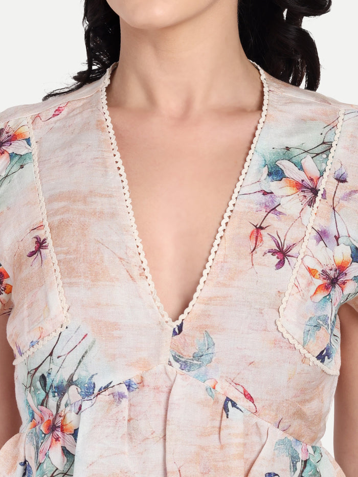 Women’s beige floral Amelia top with ruffle sleeves, soft flowy fit and elegant stylish design