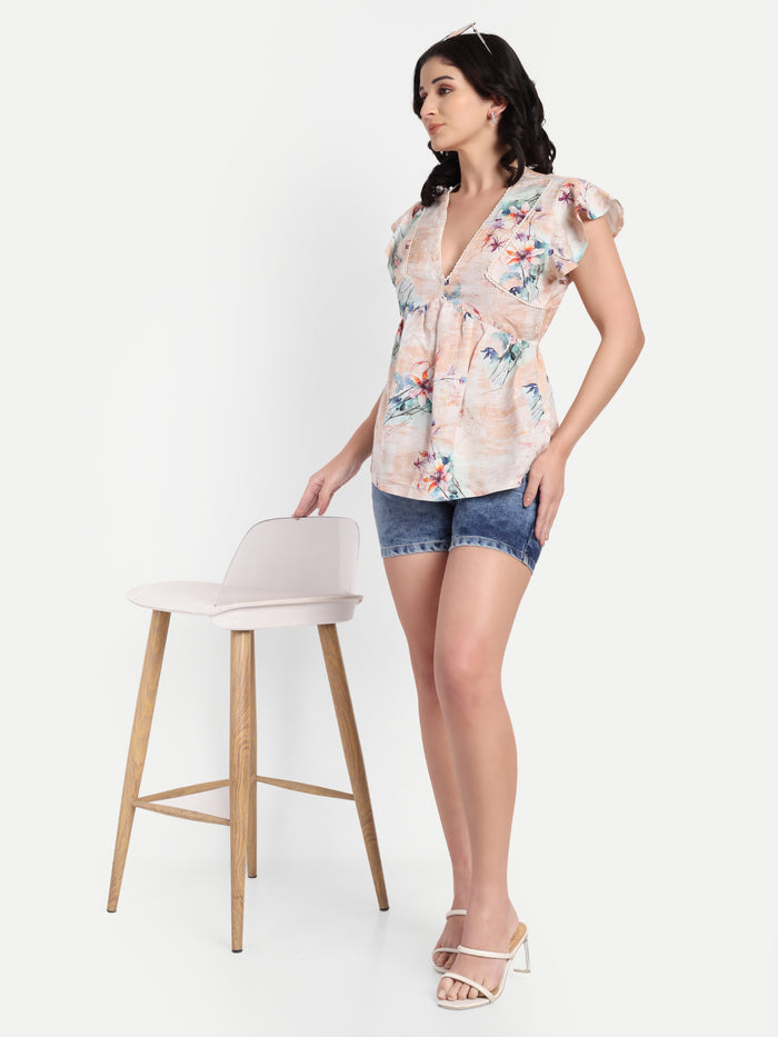 Women’s beige floral Amelia top with ruffle sleeves, soft flowy fit and elegant stylish design