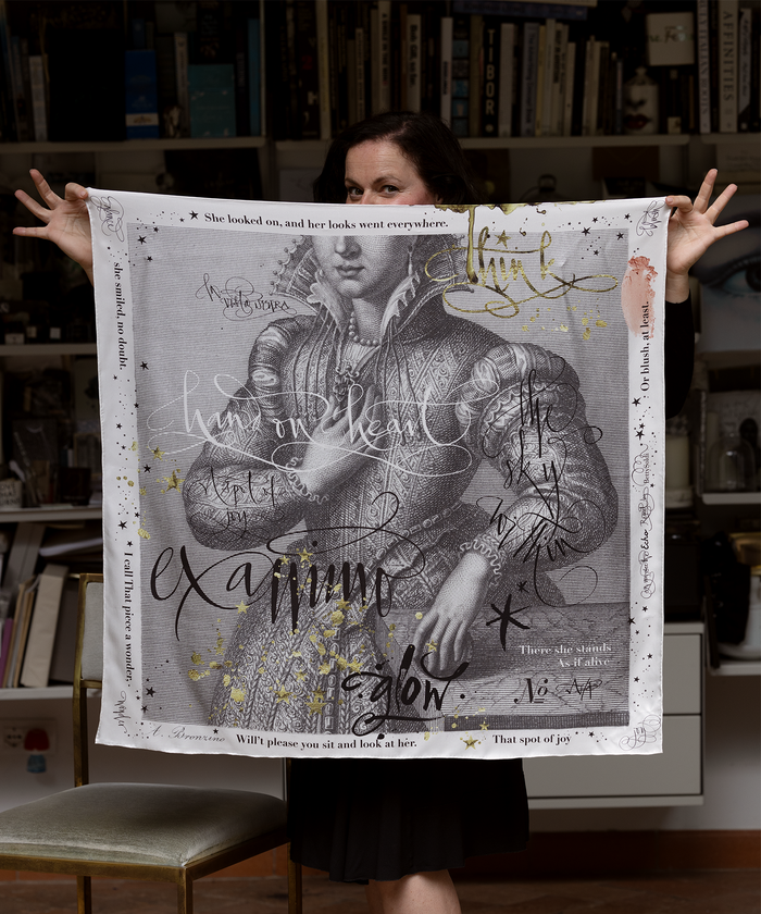 scarf designed by Betty Soldi being held by Betty Soldi