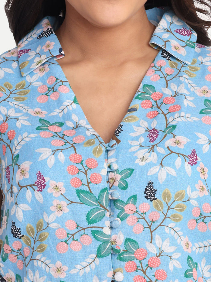Women’s blue floral Chiki sleeveless jacket with tailored fit and elegant design