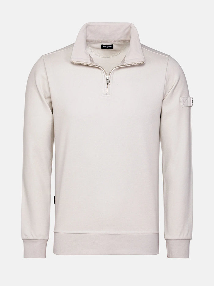 Close-up of light beige Milburn Sweater with stitching. – Wam Denim.