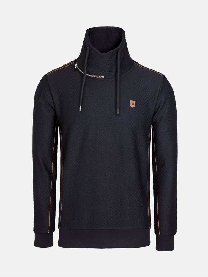 Black high-neck sweater with zipper detail and brown stitching accents – Wam Denim.