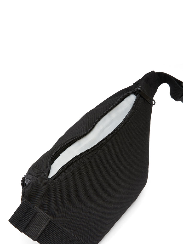 Ela Mo™ Hipbag | Schwarz, geöffnet – mit weißem Innenbereich