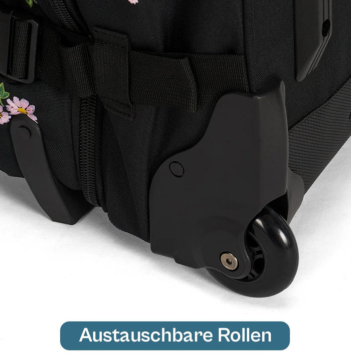 Ela Mo™ Reisetasche mit Rollen 42 Liter | Embroidery Edition Upsy Daisy. Austauschbare Rollen der floral gemusterten Tasche.