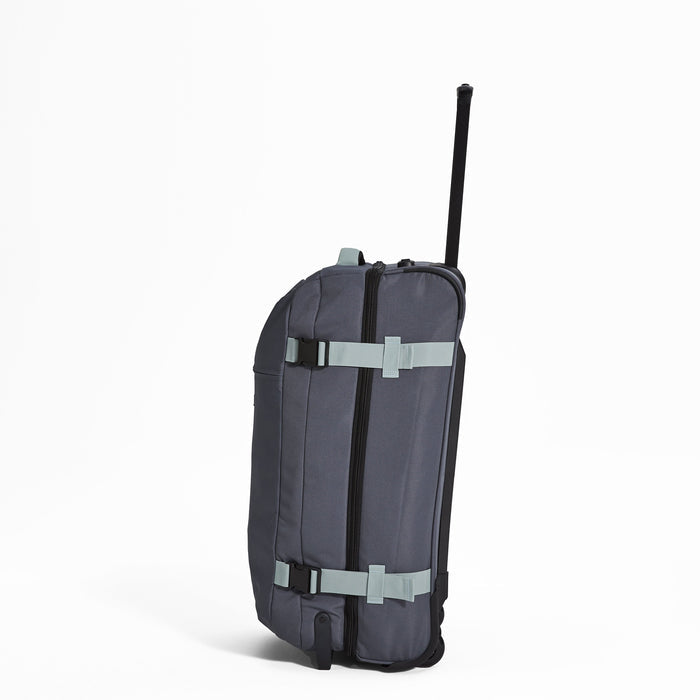 Ela Mo™ Reisetasche mit Rollen 78 Liter | Darkgrey Mint. Reisetasche mit Klickverschluss von der linken Seite.