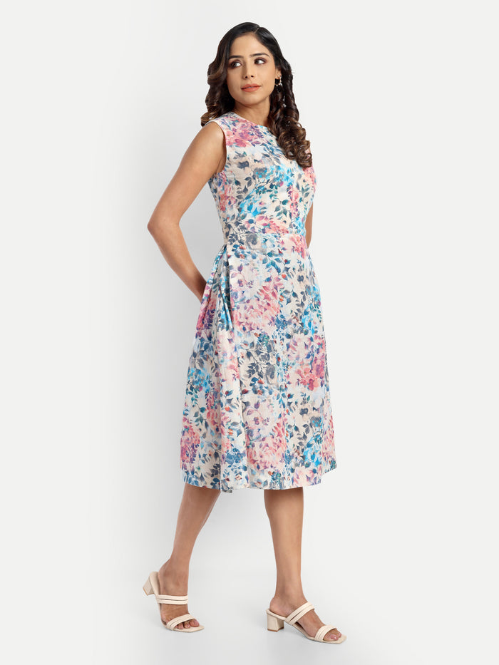 Women’s floral Kiki sleeveless midi dress with elegant fit and soft pastel print
