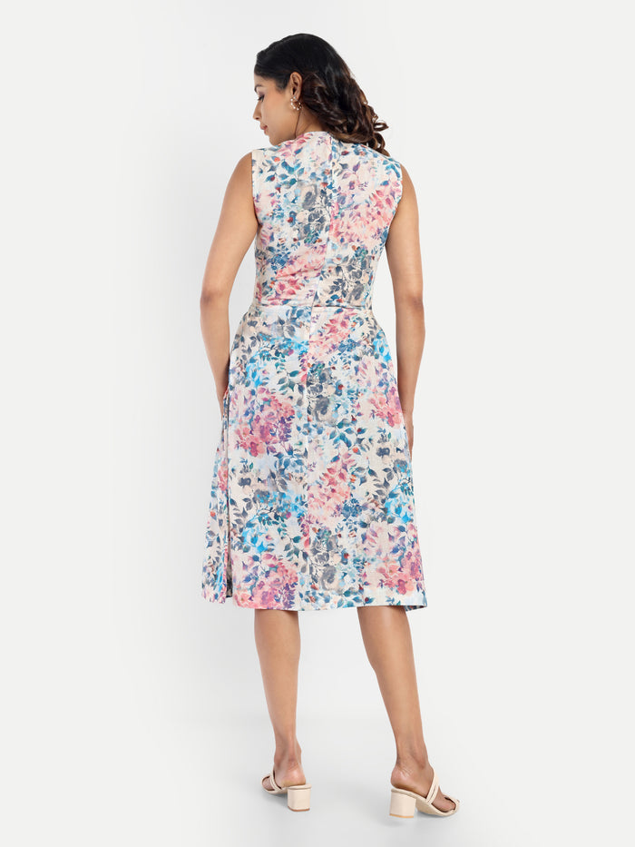 Women’s floral Kiki sleeveless midi dress with elegant fit and soft pastel print