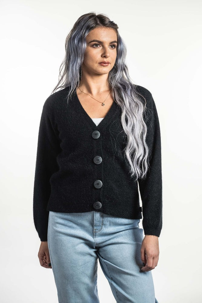 Possum and Merino  KO557 V Neck Cardigan - A modern twist on a V neck cardigan.  This style is hip length and features a wide rib detail on the hem.  Made proudly in New Zealand from a premium blend of 40% possum fur, 50% merino lambswool & 10% mulberry silk.