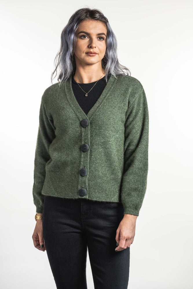 Possum and Merino  KO557 V Neck Cardigan - A modern twist on a V neck cardigan.  This style is hip length and features a wide rib detail on the hem.  Made proudly in New Zealand from a premium blend of 40% possum fur, 50% merino lambswool & 10% mulberry silk.