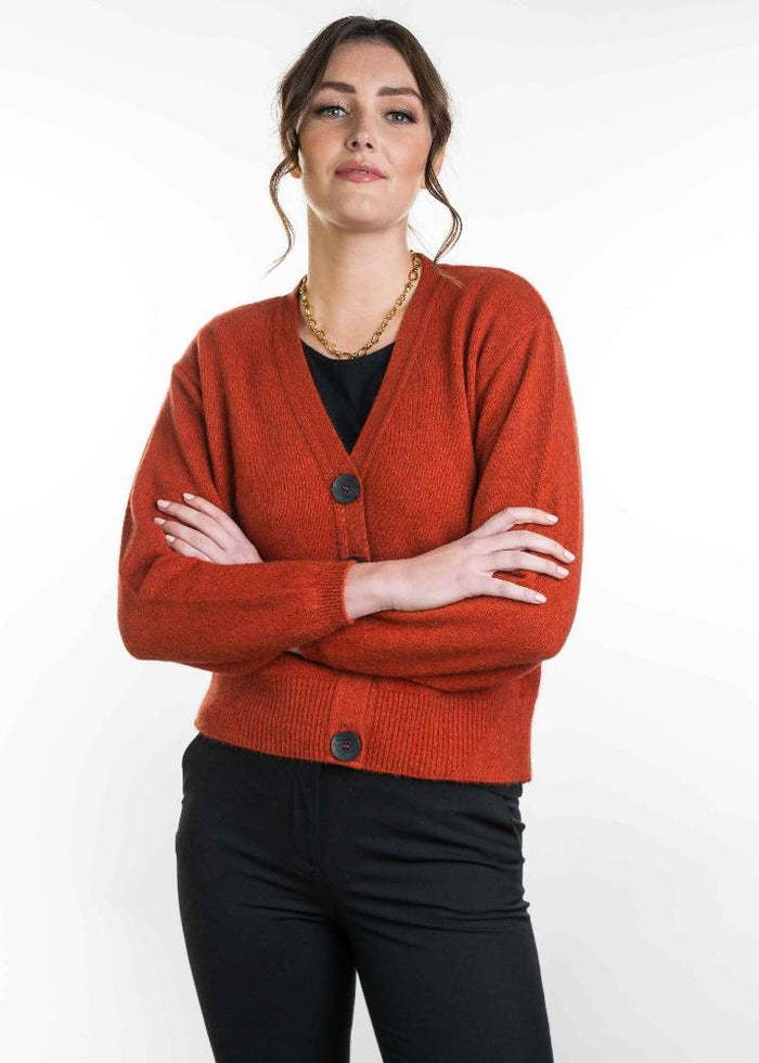 Possum and Merino  KO557 V Neck Cardigan - A modern twist on a V neck cardigan.  This style is hip length and features a wide rib detail on the hem.  Made proudly in New Zealand from a premium blend of 40% possum fur, 50% merino lambswool & 10% mulberry silk.