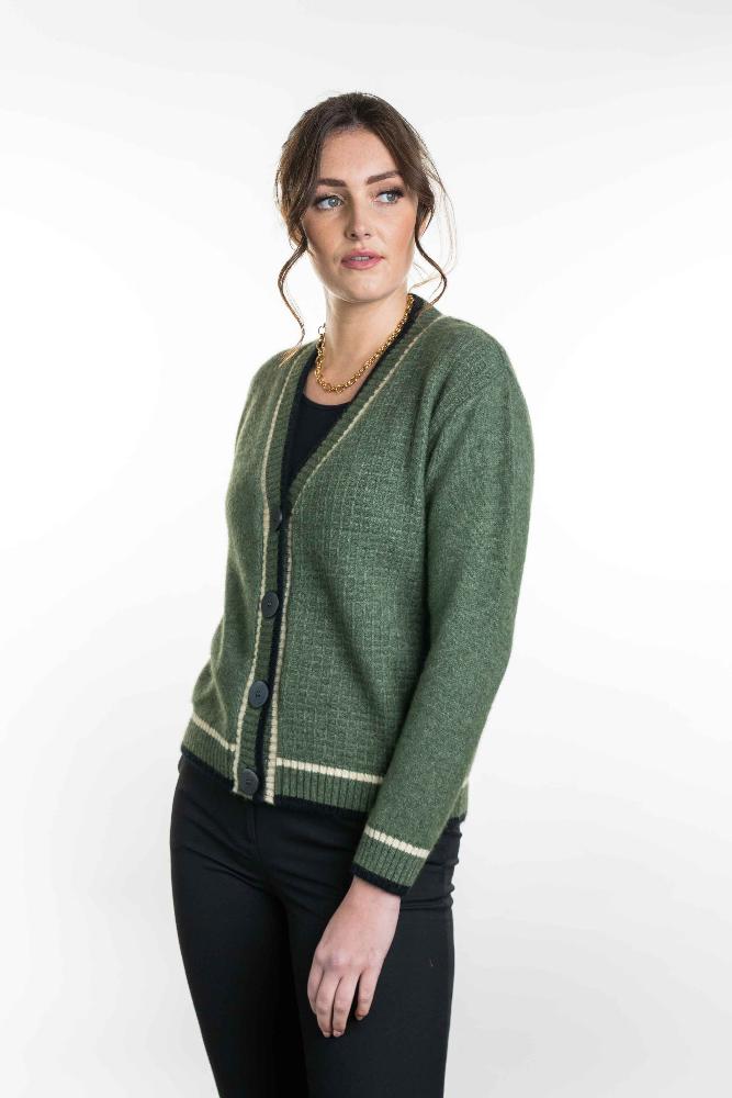 Possum and Merino

KO561 Contrast Textured Cardigan - A striking V neck cardigan with striped detailing.  This piece features alternating texture on the sleeves and body. A unique, statement piece that will be sure to get attention.

Made proudly in New Zealand from a premium blend of 40% possum fur, 50% merino lambswool and 10% mulberry silk