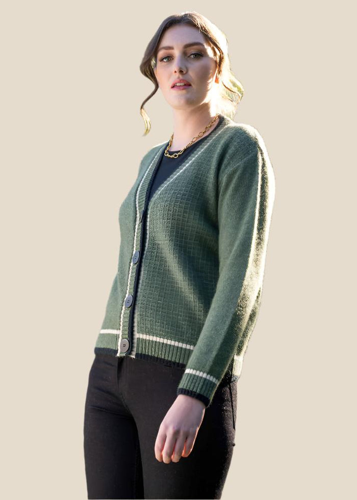 Possum and Merino

KO561 Contrast Textured Cardigan - A striking V neck cardigan with striped detailing.  This piece features alternating texture on the sleeves and body. A unique, statement piece that will be sure to get attention.

Made proudly in New Zealand from a premium blend of 40% possum fur, 50% merino lambswool and 10% mulberry silk
