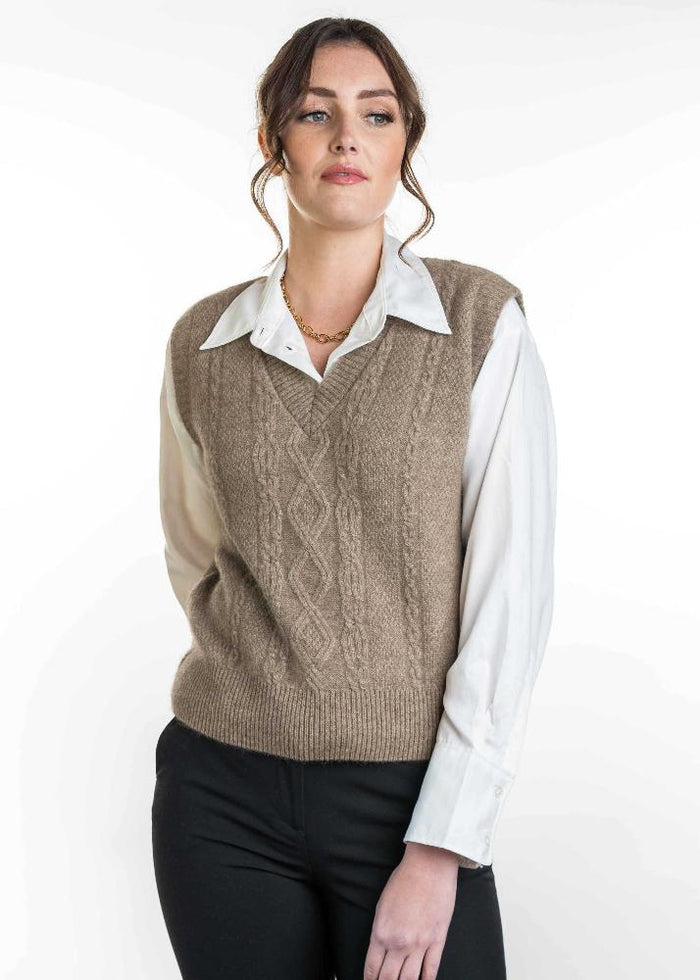 Possum and Merino

KO563 Cable Vest - A classic V Neck vest. A versatile piece for layering in every season. Crafted with vertical patterns, this vest combines a timeless design with a modern twist. Dress it up for a corporate or chic look or dress it down for an everyday casual look. An absolute wardrobe staple.

Made proudly in New Zealand from a premium blend of 40% possum fur, 50% merino lambswool and 10% mulberry silk.