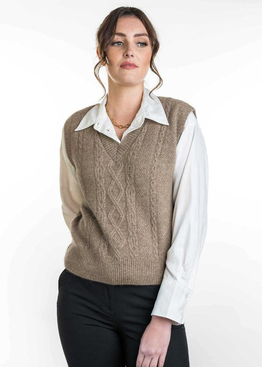 Possum and Merino

KO563 Cable Vest - A classic V Neck vest. A versatile piece for layering in every season. Crafted with vertical patterns, this vest combines a timeless design with a modern twist. Dress it up for a corporate or chic look or dress it down for an everyday casual look. An absolute wardrobe staple.

Made proudly in New Zealand from a premium blend of 40% possum fur, 50% merino lambswool and 10% mulberry silk.