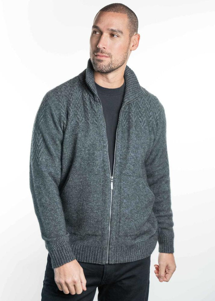 Possum and Merino

KO873 Chevron Zip Jacket - A zip through Jacket with a textured pattern on the chest and sleeves. This garment has knitted in pockets.

Made proudly in New Zealand from a premium blend of 40% possum fur, 50% merino lambswool and 10% mulberry silk.