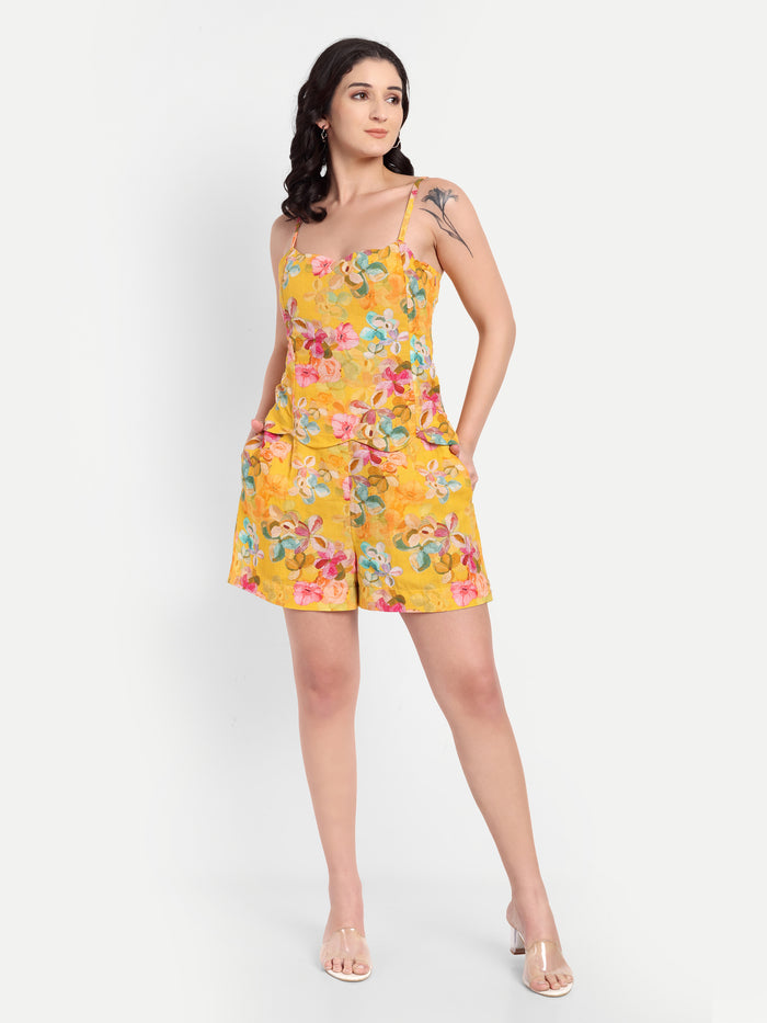 Women’s yellow floral Leo top CB with sleeveless design, relaxed fit and stylish summer look