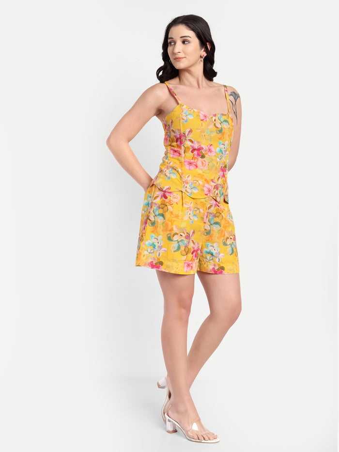 Women’s yellow floral Leo top CB with sleeveless design, relaxed fit and stylish summer look
