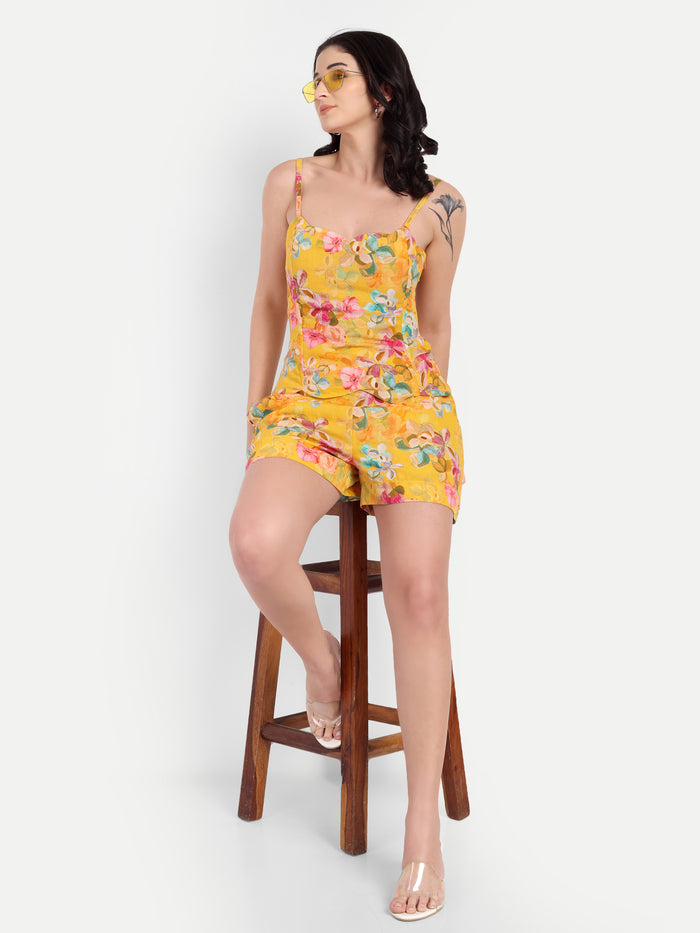 Women’s yellow floral Leo top CB with sleeveless design, relaxed fit and stylish summer look