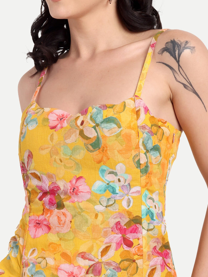 Women’s yellow floral Leo top with sleeveless design, relaxed fit and stylish summer look